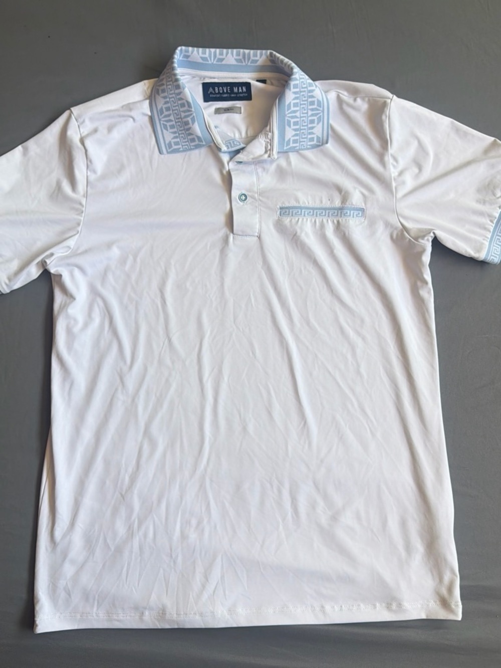 White Polo with Light Blue Geometric Trim